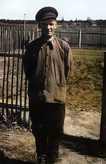  My father's father, in other words my grandfather, Vassili, with a dairy cow he was permitted to keep.
